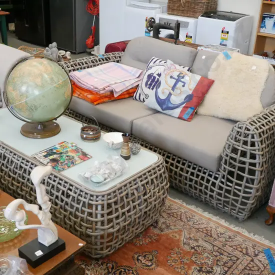 woven plastic outdoor 2 seater settee with matching glass top coffee table