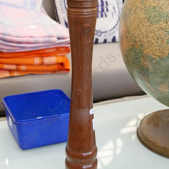 tall wooden pepper grinder