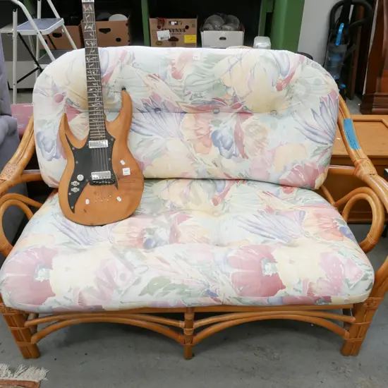 cane 2 seater settee with upholstered cushions 