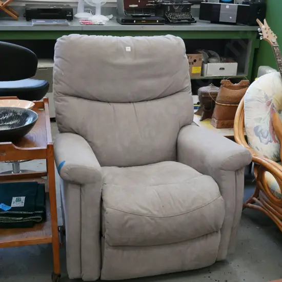 grey upholstered rocker recliner arm chair, some marks to upholstery