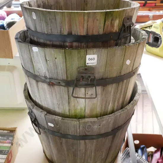 4x graduated wooden buckets