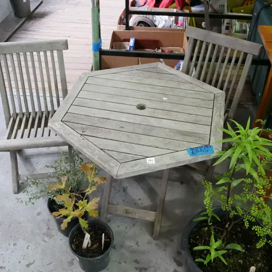 hardwood child's outdoor table with 2 chairs