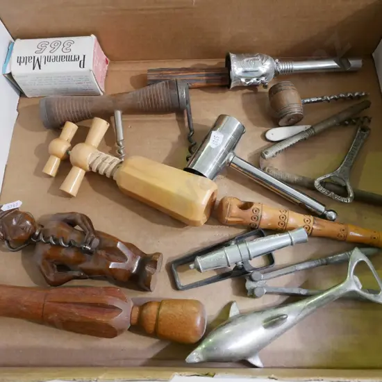 box of bottle openers, corkscrews  etc