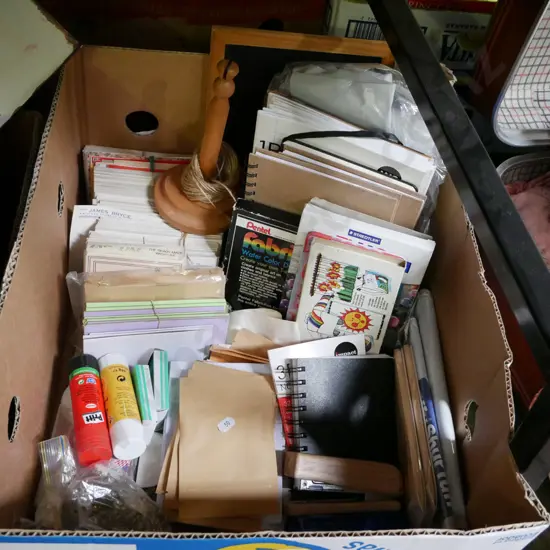 box; stationery supplies, glue guns, exercise books etc
