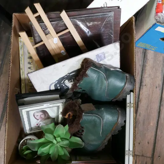 box; photo albums, easel, tramping boots etc