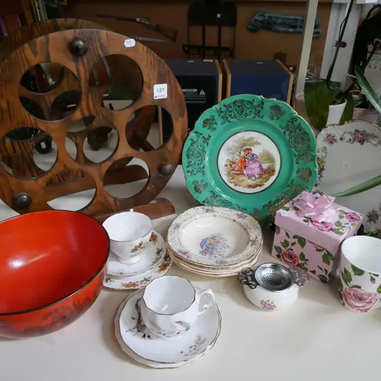 wooden wine rack, cabinet plates, Adams bowl, tea strainer etc