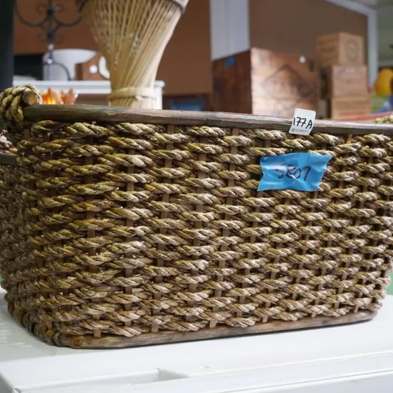 small woven seagrass basket (some fraying)