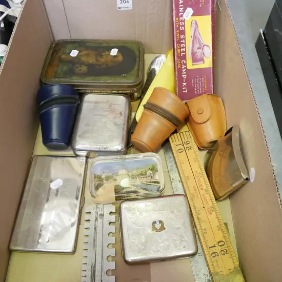 box; travel cups, cigarette cases, camping cutlery etc