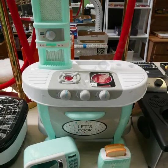 child's plastic stove, toaster, microwave