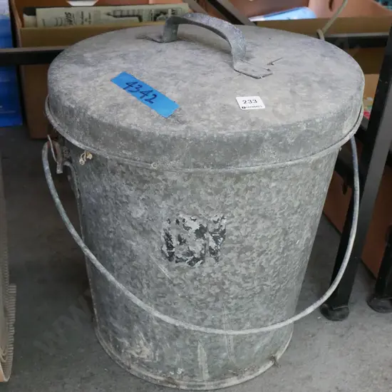 galvanised lidded ash can