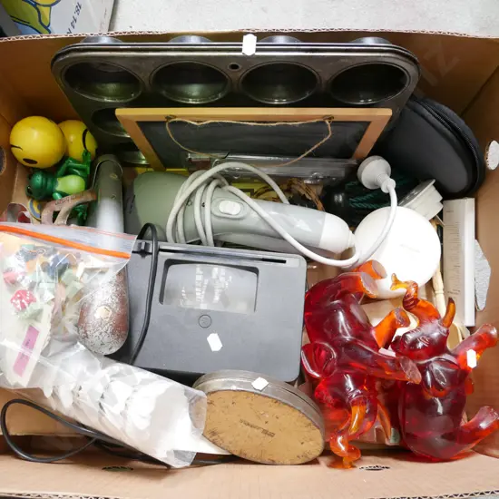 box; shuttle cocks, resin elephants, hand held massager etc