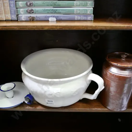 chamber pot, candlestick, small lidded storage crock