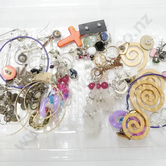 tray of costume earrings