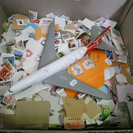box of loose stamps, model Qantas plane