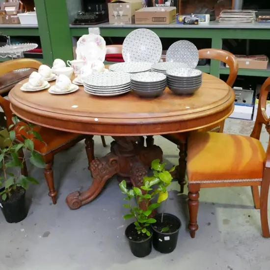 Victorian ornately carved pedestal table with 4x mahogany orange upholstered chairs H-800 W-1300 D-1000