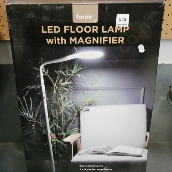 boxed LED floor lamp with magnifier