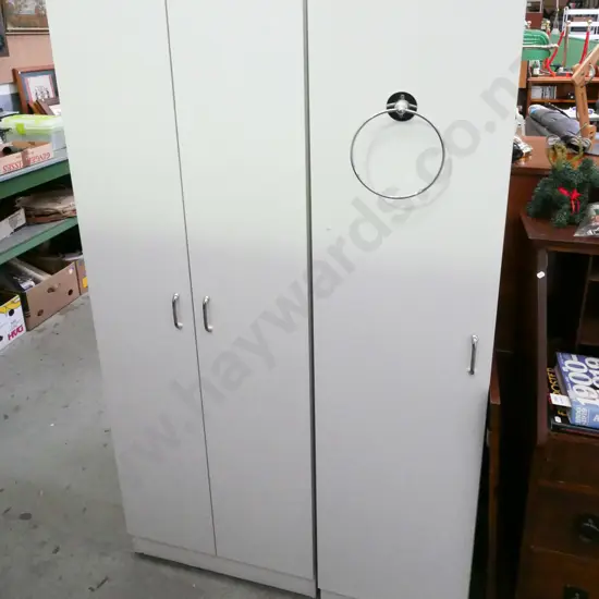 1x single door, 1x double door laundry cupboards with internal shelves