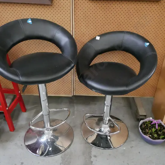 2x black vinyl and chrome stools