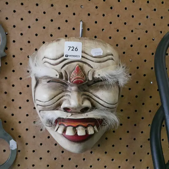 carved wooden Asian mask