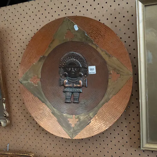 beaten copper and brass Mayan wall charger