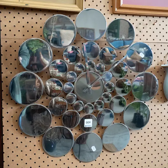 contemporary polished metal wall clock