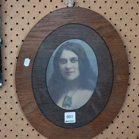 framed female portrait