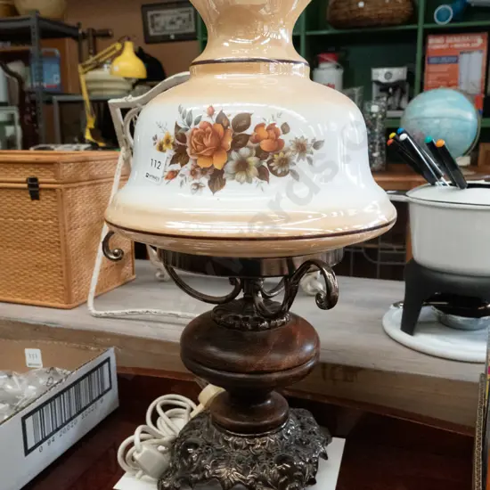 metal and wood based floral table lamp