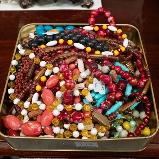 tin of costume jewellery