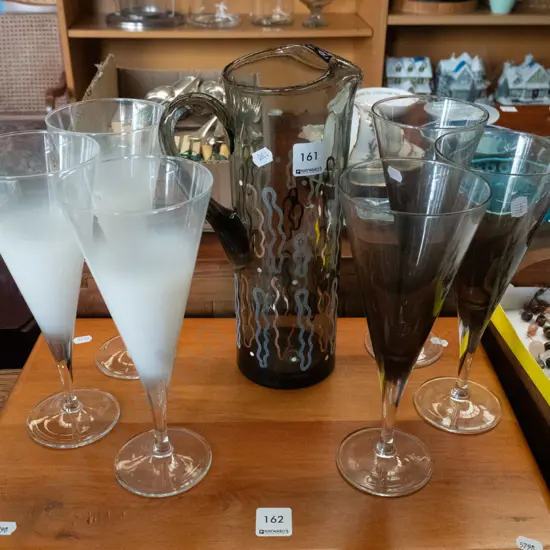 smoked glass water jug and 6 cocktail glasses