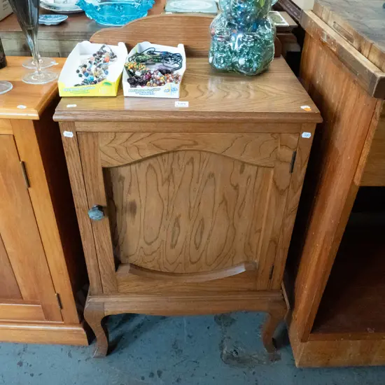 single door oak pot cupboard - some borer in right back leg