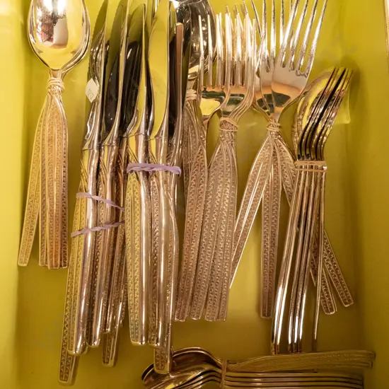 box of plated cutlery