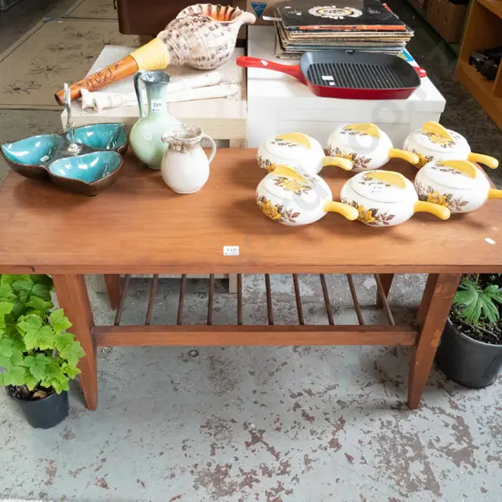 solid wood coffee table with magazine rack
