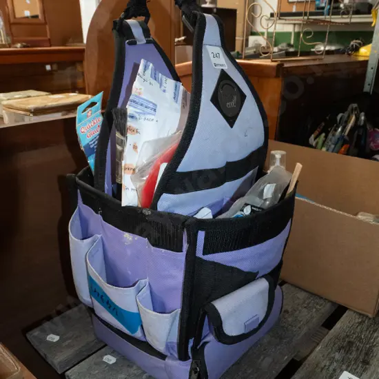 crafter's basket with various craft supplies