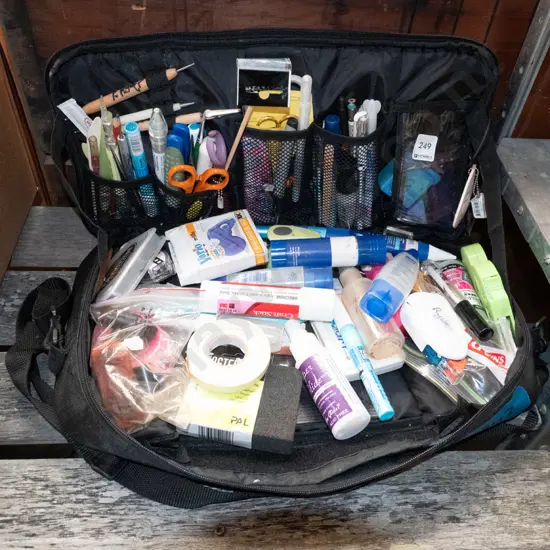 crafter's bag with assorted craft supplies