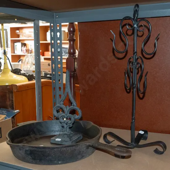 cast iron frying pan, finial, stand