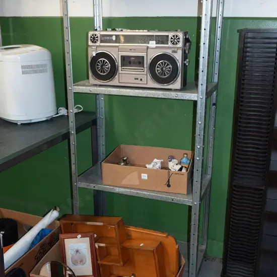 metal workshop shelves - top shelf missing 1 bolt