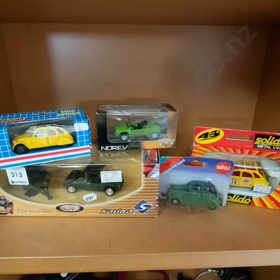 5x boxed model vehicles