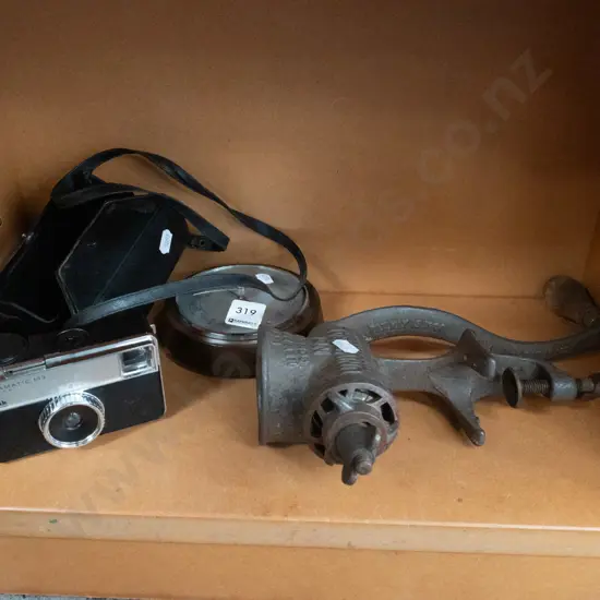 Kodak 35mm camera, bench top mincer, wall mounted barometer