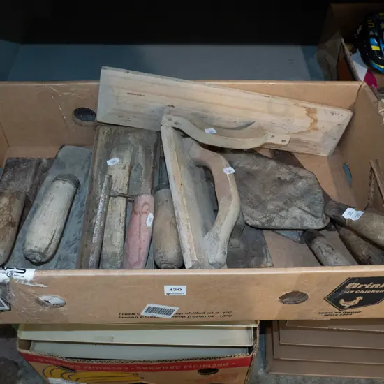 box of plastering trowels