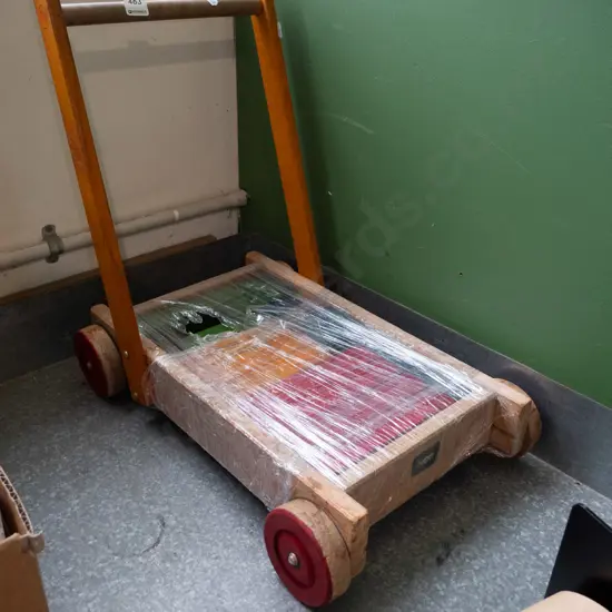 child's trolley and wooden blocks