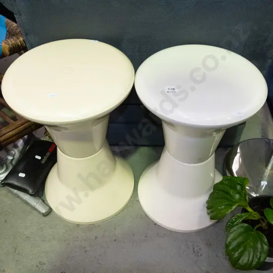 2 plastic shower stools