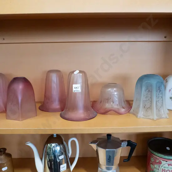 shelf of Edwardian light shades
