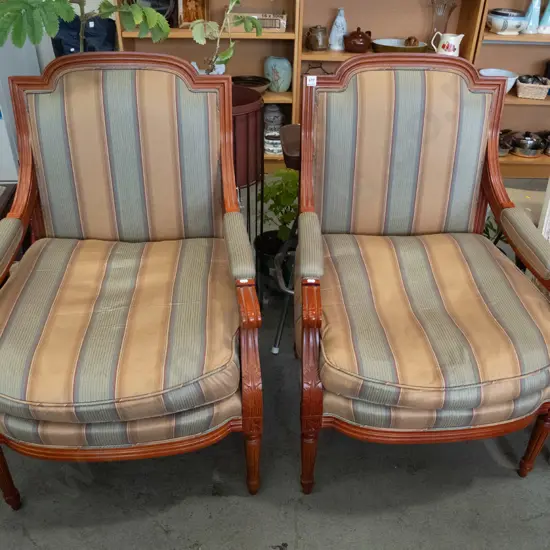 pair of striped armchairs