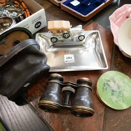 automobile ashtray, vintage binoculars, powder compact
