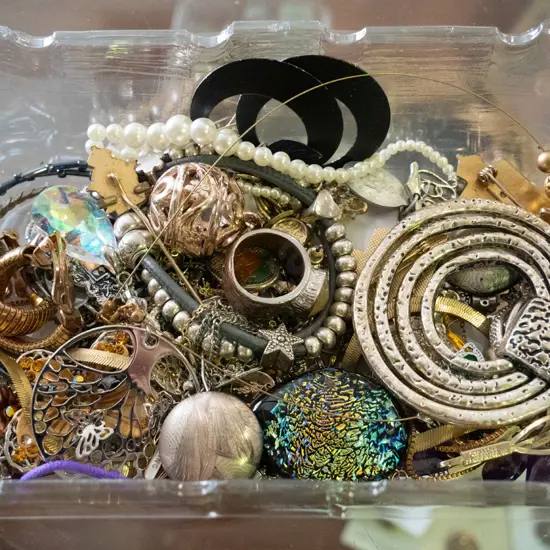 plastic tray of costume jewellery