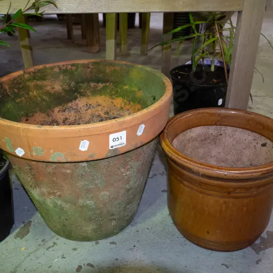 1x terracotta and 1x glazed garden planter