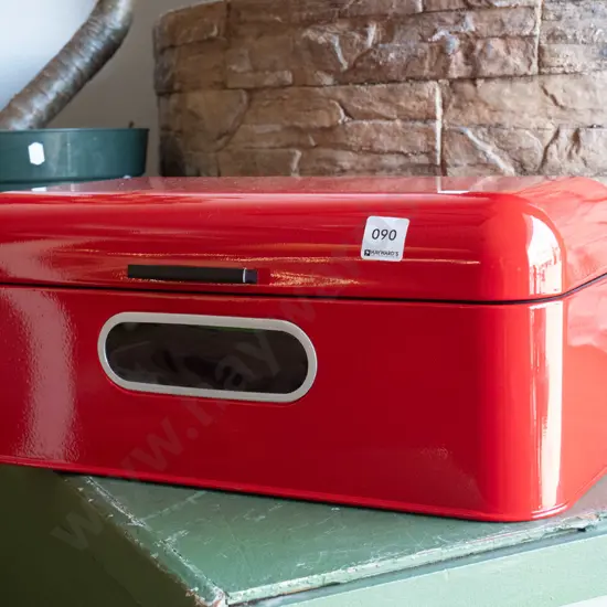 red metal bread bin