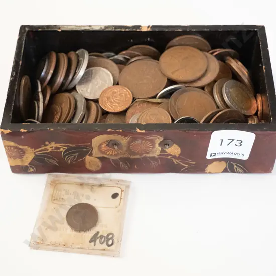small wooden box and coins