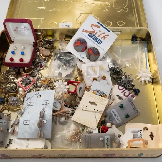 tin of costume jewellery