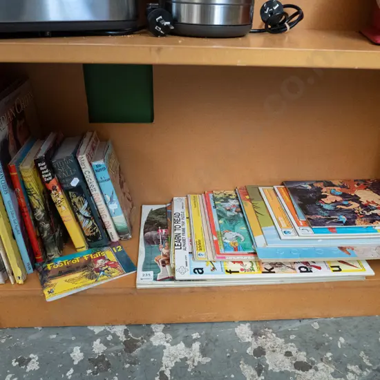 shelf; books and puzzles